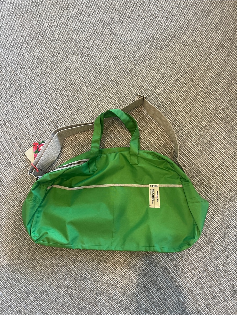 Shanghai Trio green satchel.